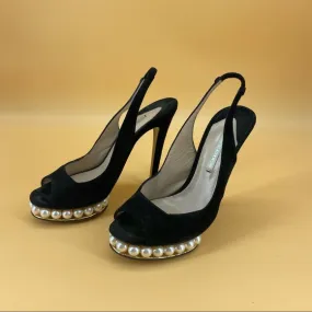 NICHOLAS KIRKWOOD peals high heels