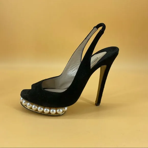 NICHOLAS KIRKWOOD peals high heels